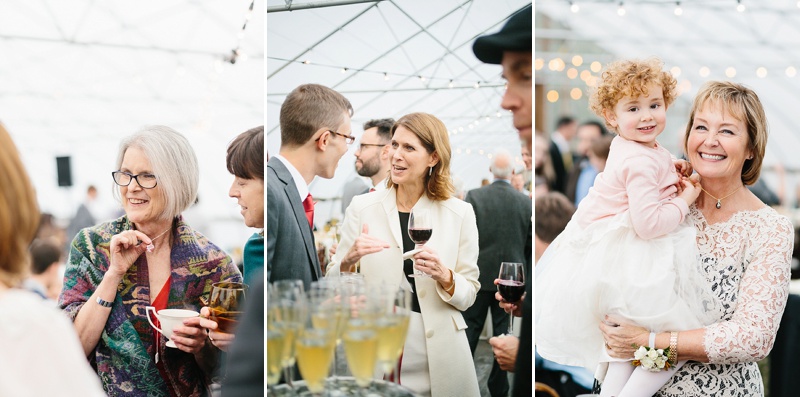 people talking with champagne at a diamond hill farm wedding